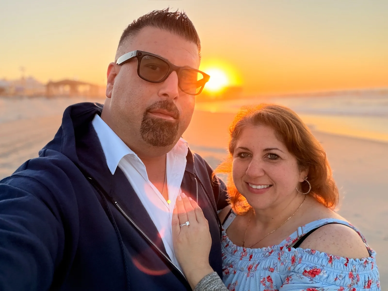 Nicole Mendys and Jay Urbaniak together near the beach at sunrise